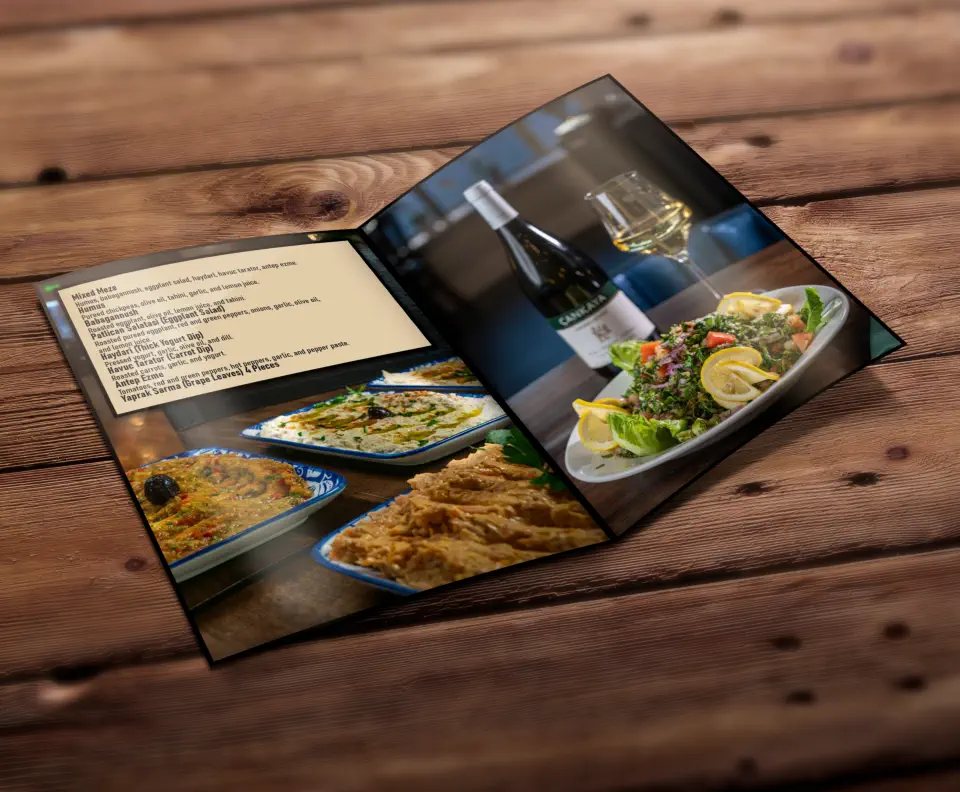 The Pasha menu open on a wooden table